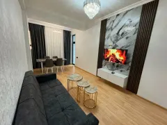 Kirayə 2 otaqlı Mənzil 70 m² Nərimanov r. – şəkil 1