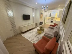 Kirayə 2 otaqlı Mənzil 70 m² Nəsimi r. – şəkil 1